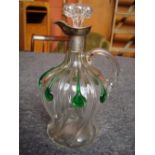 An Edwardian silver mounted glass claret jug and stopper, marked for Birmingham,