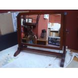 A 19th Century rectangular swing toilet mirror.