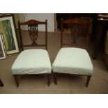 Two Edwardian low bedroom chairs.