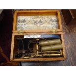 A Victorian wooden cased improves patent magneto electro machine for nervous diseases, with winder.