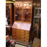 A George III and later mahogany fall front bureau bookcase,