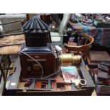 A mahogany and brass magic lantern/projector, fitted for electricity,