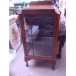 An early 20th Century display cabinet on cabriole legs.