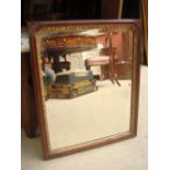 A George III style mahogany bevelled glass mirror.