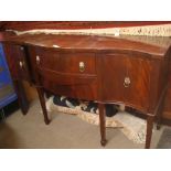 A reproduction mahogany sideboard.