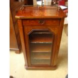 A late 19th Century mahogany glazed sheet music cabinet.