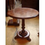 A 19th Century circular mahogany side table.