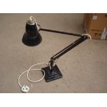 A Herbert Terry black anglepoise lamp.