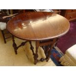 A late 19th Century gateleg oval table.