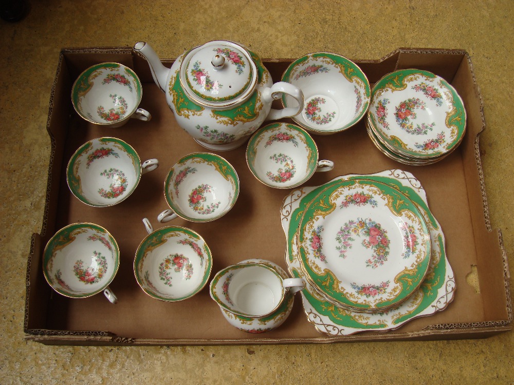 A Tuscan 'Naples' complete tea service comprising six cups, six saucers, six plates, tea pot,