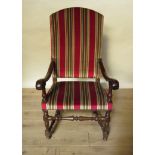 A 19th Century Dutch walnut throne chair with striped upholstery,