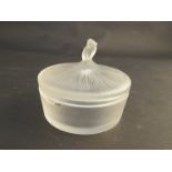 A Lalique lidded circular pot; the lid with ballerina figure with her skirt forming the lid,