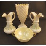 Four pieces of Belleek Third Period ceramics including pair of jugs,