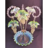 A Victorian vaseline green glass epergne of candy cane and trumpet form,