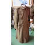 A WWII British Army officers great coat with Royal Pioneer Corps badges and officers pips to