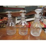 Three Georgian ring neck decanters with stoppers