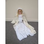 A 19th Century composition doll,