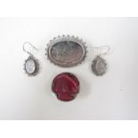 A Victorian engraved silver brooch and a pair of matching earrings with an Art Nouveau silver hat