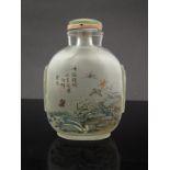 A Chinese interior painted glass snuff bottle with cicada on rocks and vegetation with butterflies,