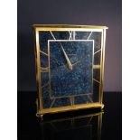 A Jaeger LeCoultre brass and lapis lazuli electric mantel clock.