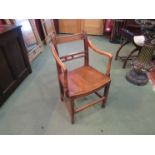 A George III East Anglia ball back carver chair (seat cracked,