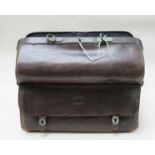 A Mappin and Webb vintage leather fitted case with contents including bottles,