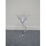 An oversized cocktail glass,