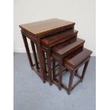 A nest of four Oriental hardwood tables