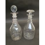 A near pair of Georgian decanters with stoppers