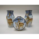 A pair of Moorcroft Enamels "Woodland King" vases 9cm tall (one second) and a "Woodland King"