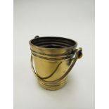 A brass "bucket" vesta container