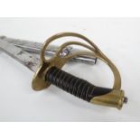 A Cavalry sabre of French M1822 pattern / US Civil War design with brass swept hilt, leather grips,