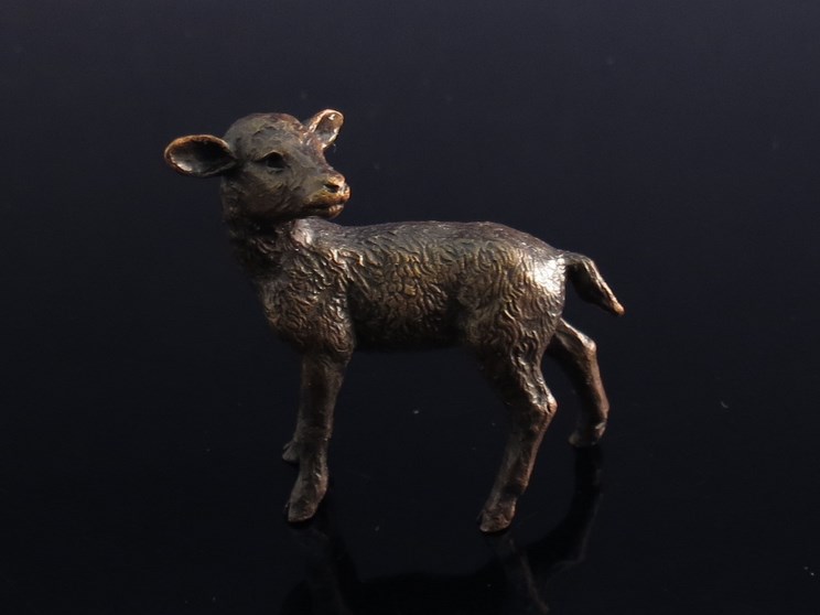 A limited edition solid bronze figure of a lamb 158/250