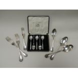 A set of silver coffee spoons and a collection of Christofle flatware including six table forks,