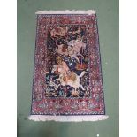 A late 20th Century Eastern wool rug,