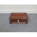 An early 19th Century tea caddy of various woods in original condition, circa 1840,