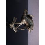 A limited edition bronze figure of a hare running 156/200 6.