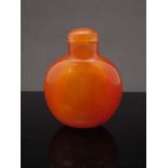 An 18th-19th Century Chinese Cornelian snuff bottle of small rounded form,