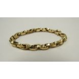 A gold fancy link bracelet stamped 375, 6.