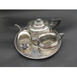 A silver plated tea set on tray