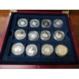 A set of 24 silver proof coins commemorating the life of Queen Elizabeth the Queen Mother,