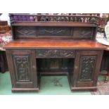 A 17th Century and later twin pedestal oak sideboard the raised spindle gallery and shelf over two