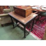 A 19th Century carved oak hall table with lion mask supports over foliate and pierced carved base,