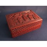 A red Chinese cinnabar box,