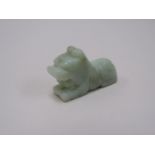 A carved jade figure of a dog,