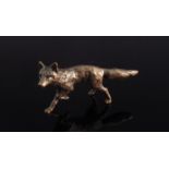 A miniature solid bronze fox,