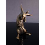 A limited edition bronze figure of a hare grooming 24/250,