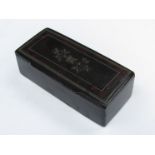 A 19th Century papier maché snuff box with tortoiseshell and white metal inlay