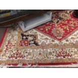 A modern red ground Heriz rug 1.90m x 1.