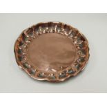 An Arts & Crafts design copper card tray with scallop design